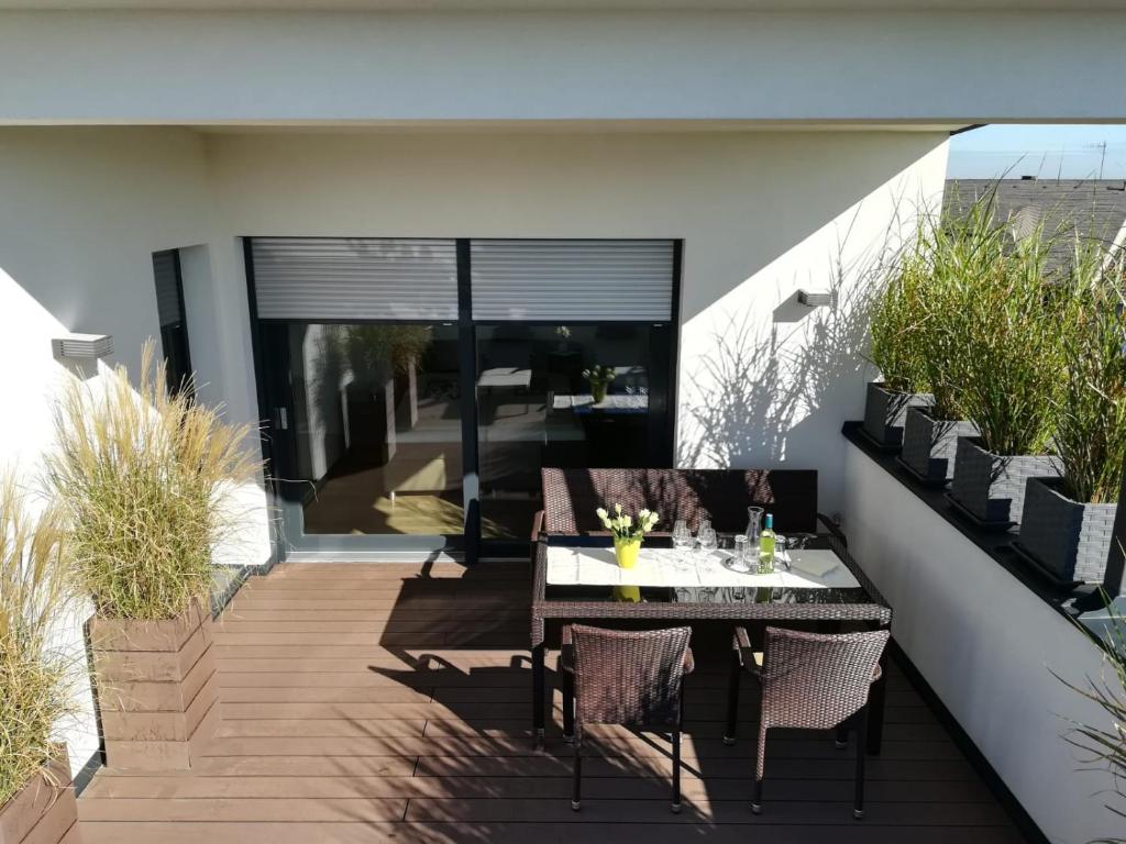 Balkón nebo terasa v ubytování PENTHOUSE Griemann 2 für max 4 Personen mit eigener großer Dachterrasse zum Relaxen!