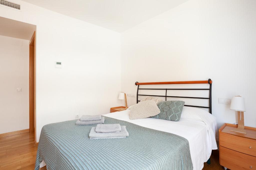 Postel nebo postele na pokoji v ubytování Lets Holidays apartment Ancora 5