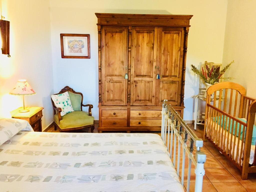 Postel nebo postele na pokoji v ubytování CASA RURAL DE ENSUEÑO