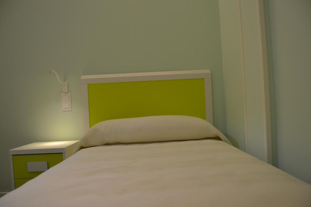 Postel nebo postele na pokoji v ubytování Hotel Español