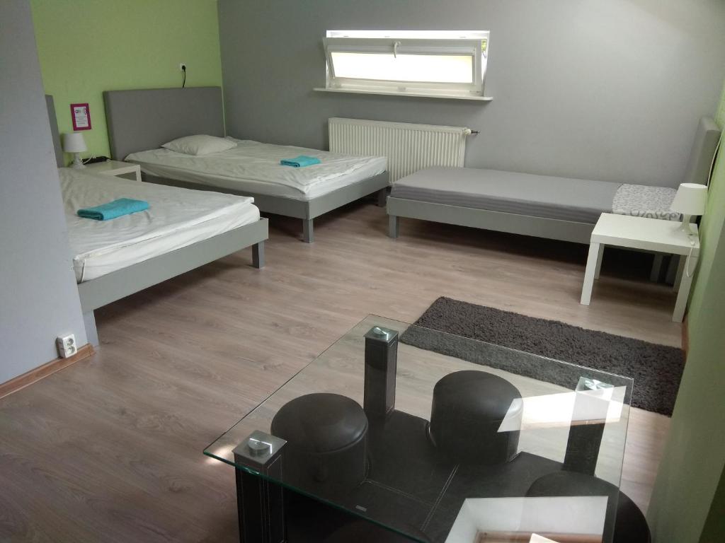 Postel nebo postele na pokoji v ubytování Olive Hostel
