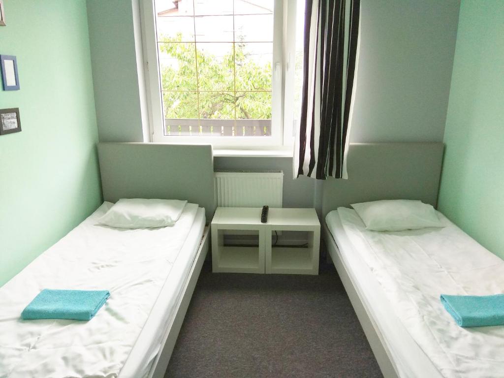 Postel nebo postele na pokoji v ubytování Olive Hostel