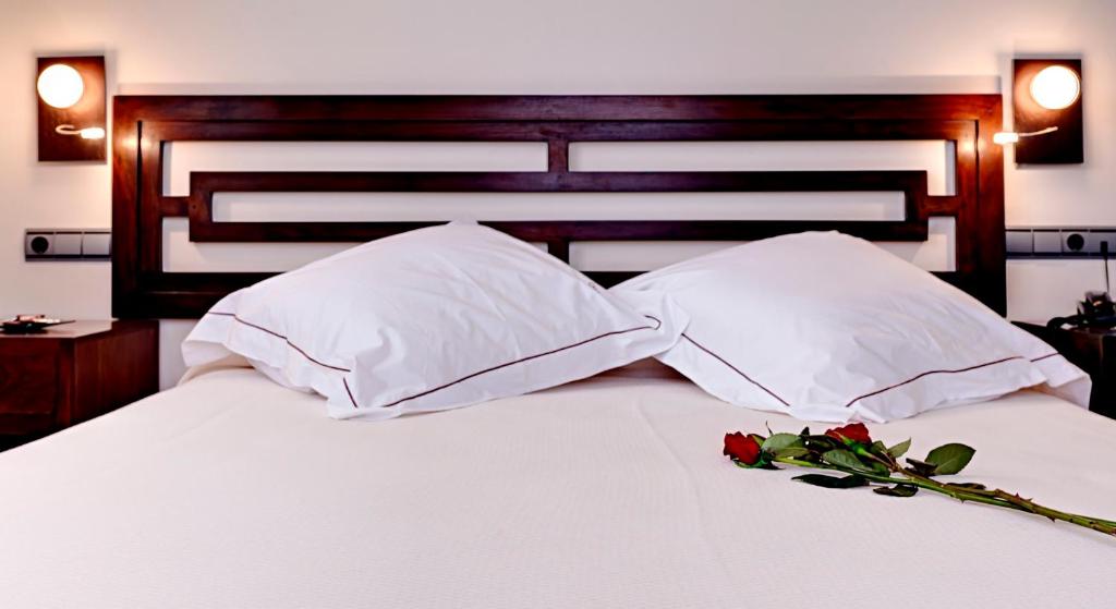 Postel nebo postele na pokoji v ubytování Casa del Trigo