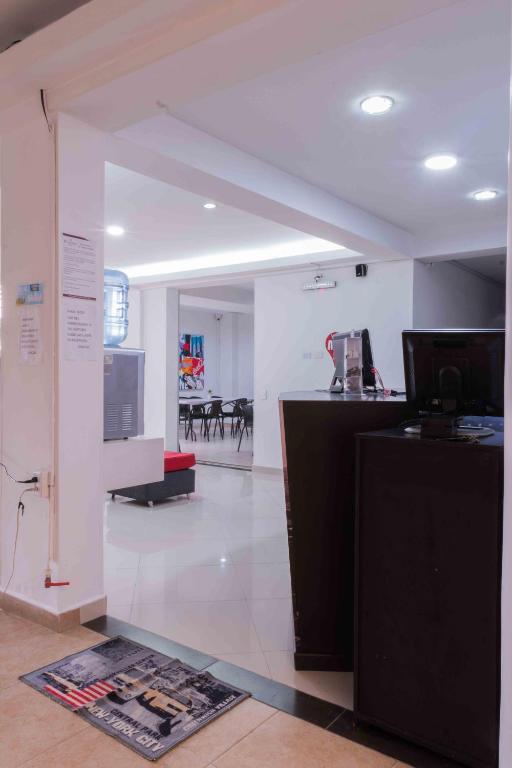 Kuchyň nebo kuchyňský kout v ubytování Hotel Quinta Avenida