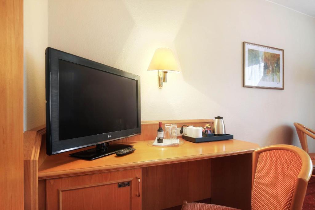 TV a/nebo společenská místnost v ubytování Parkhotel Diani