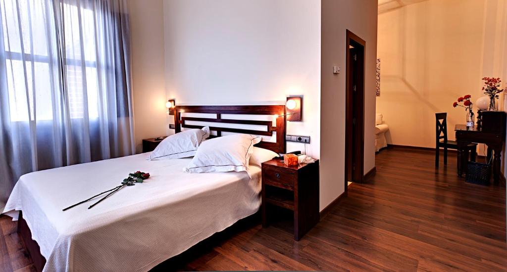 Postel nebo postele na pokoji v ubytování Casa del Trigo