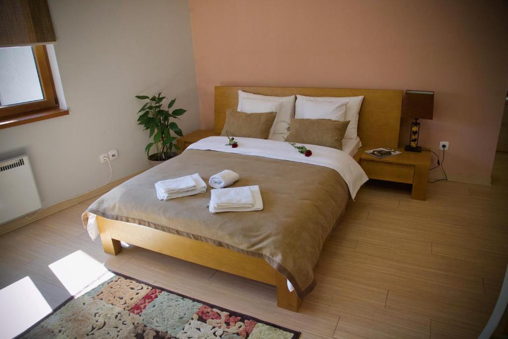 Postel nebo postele na pokoji v ubytování Apartments Villa Splendor