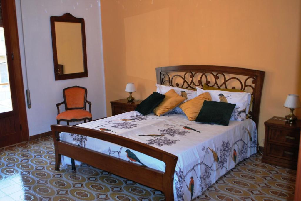 Tempat tidur dalam kamar di Casa Carmela e Turiddru