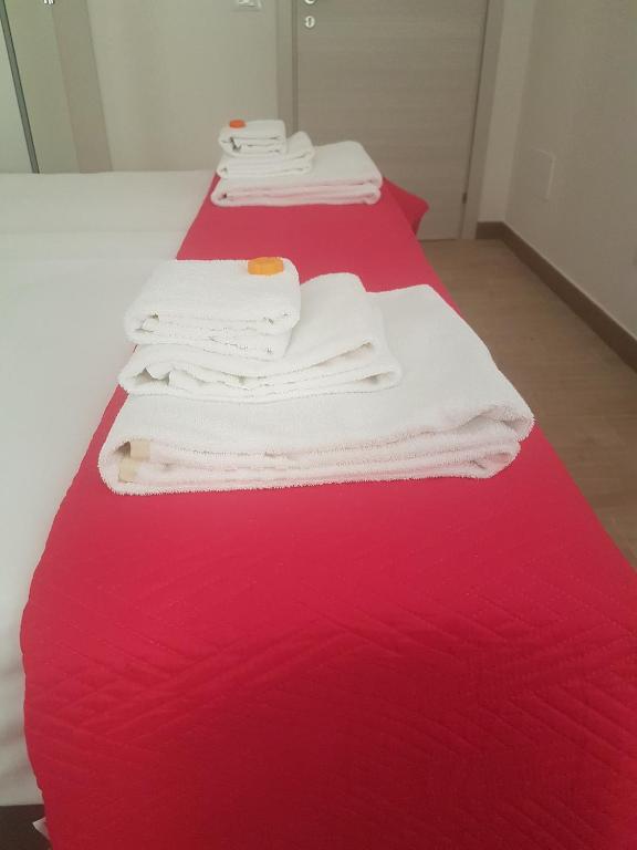 Postel nebo postele na pokoji v ubytování Parfumerie 5 Terre
