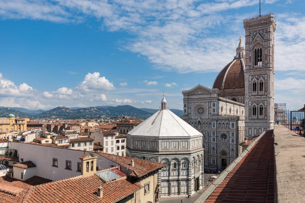 a view of a cathedral and a city with buildings at Apartment Duomo in Florence