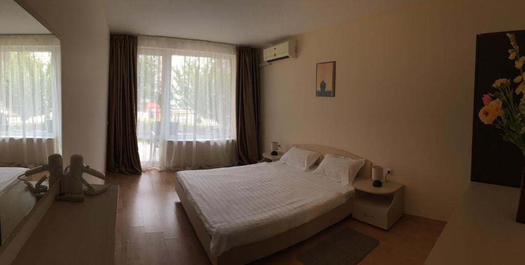 Cama o camas de una habitación en Marina Panorama Grand Resort Private Apartments