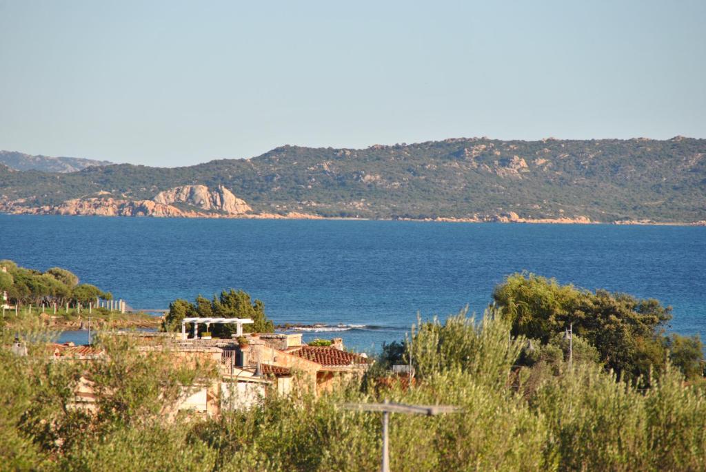 a village on the shore of a body of water at Sardegna Pittulongu in Olbia