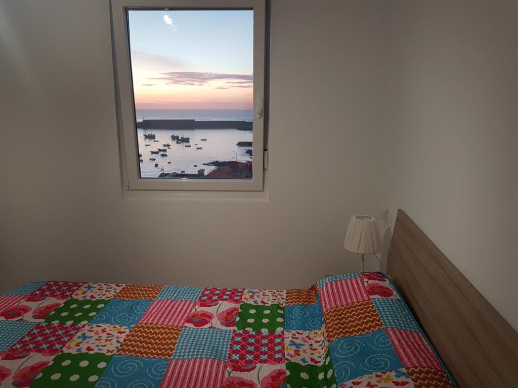 Posteľ alebo postele v izbe v ubytovaní Casa con vistas al mar en A Guarda