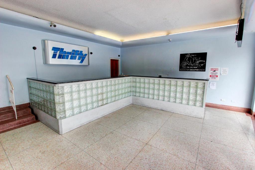 TV a/nebo společenská místnost v ubytování Geneva Hotel