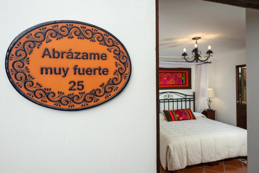 Postel nebo postele na pokoji v ubytování Hotel Tapalpa de Mis Amores