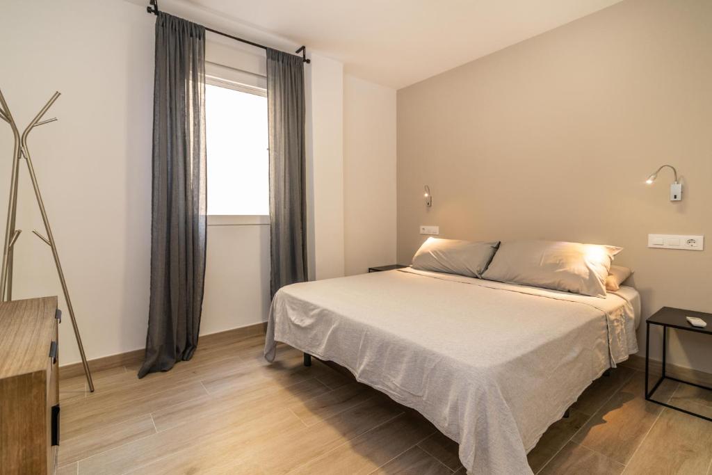 Posteľ alebo postele v izbe v ubytovaní Luxury Apartment Soho by Nagoa Homes
