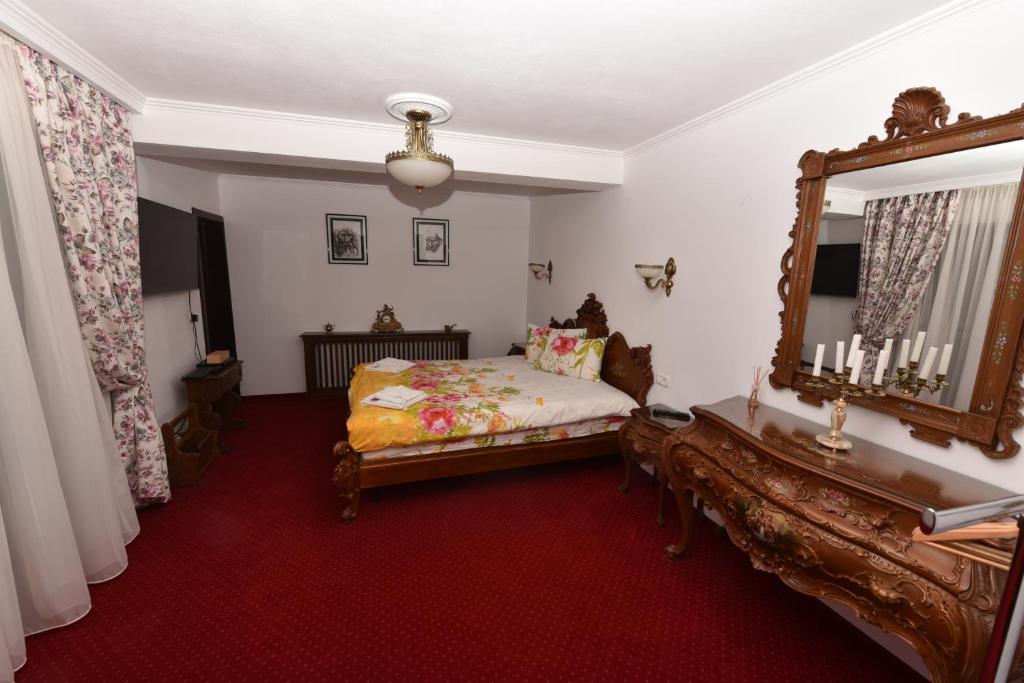 Postel nebo postele na pokoji v ubytování Casa Andrei