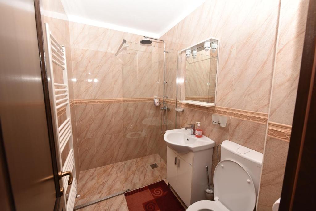 Koupelna v ubytování Casa Andrei
