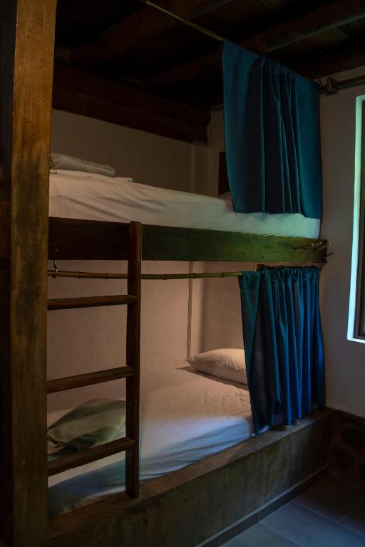 Postel nebo postele na pokoji v ubytování Cinnamon House