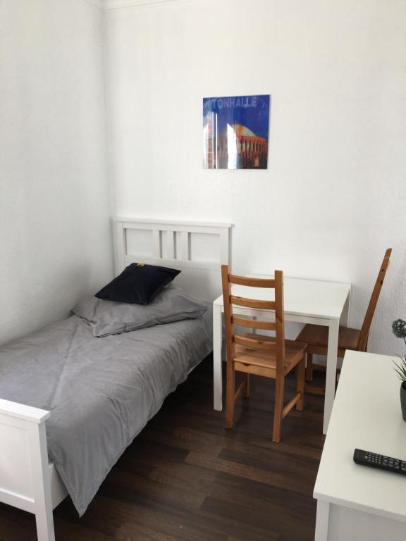 Postel nebo postele na pokoji v ubytování Zum armen Mann