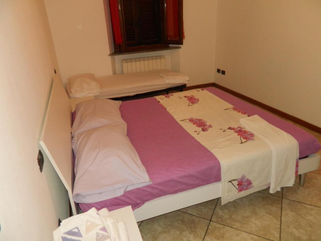 Postel nebo postele na pokoji v ubytování Appartamento Mira