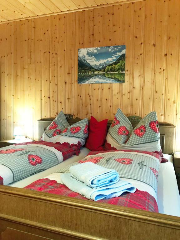 Postel nebo postele na pokoji v ubytování Ferienhaus Bergfee