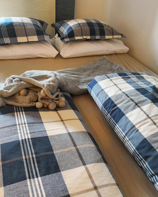 Posteľ alebo postele v izbe v ubytovaní Apartman Bilja 3*