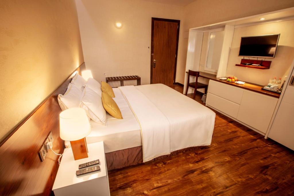 Postel nebo postele na pokoji v ubytování Sevana City Hotel