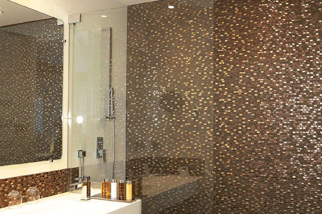 Koupelna v ubytování Oz'Inn Hôtel & Spa