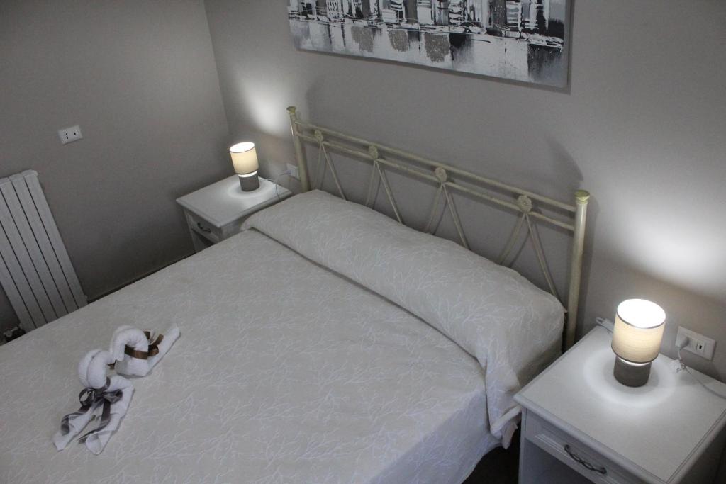 Postel nebo postele na pokoji v ubytování Bed & Breakfast San Marco