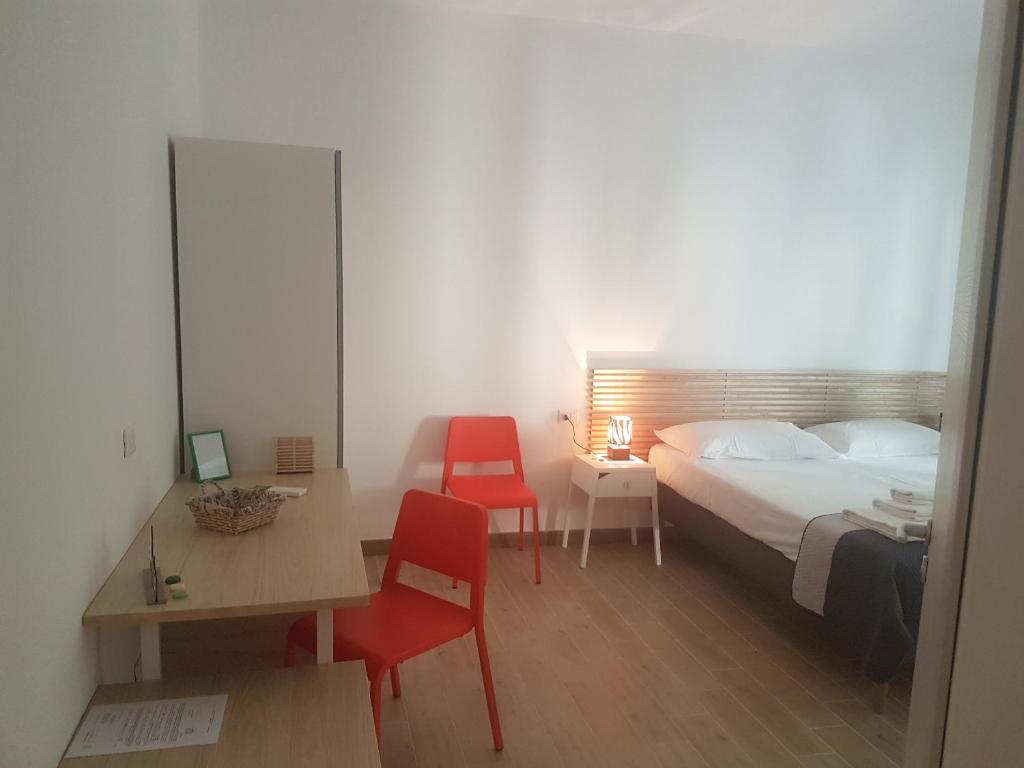 Postel nebo postele na pokoji v ubytování Parfumerie 5 Terre