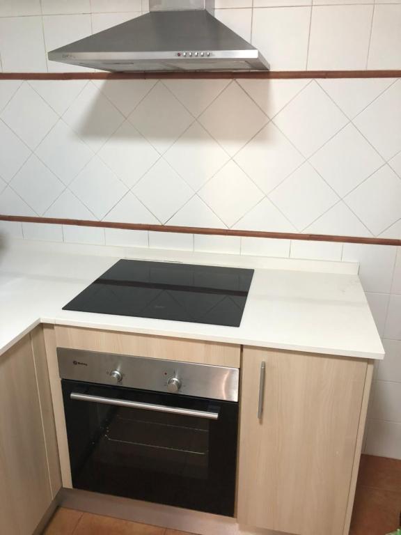 Kuchyň nebo kuchyňský kout v ubytování Apartamento Asuncion
