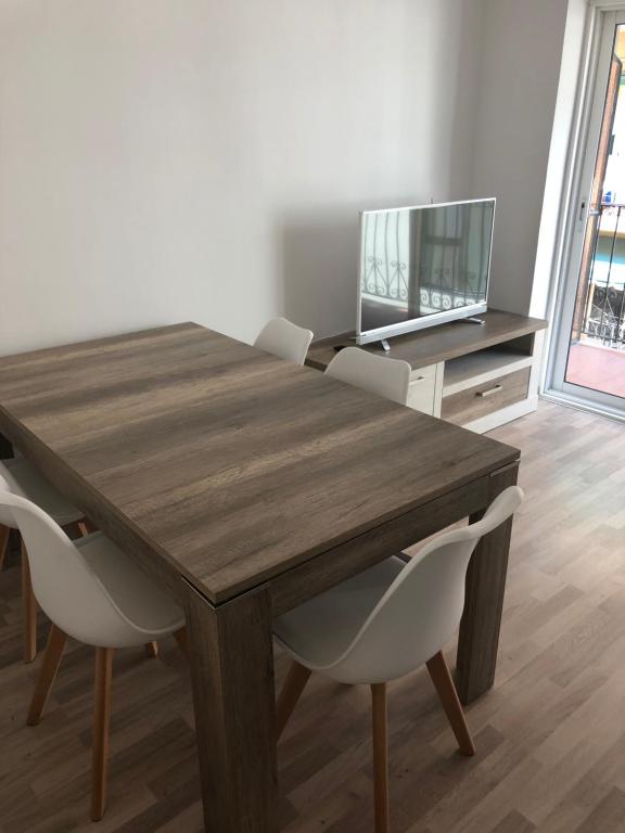 TV a/nebo společenská místnost v ubytování Apartamento Asuncion
