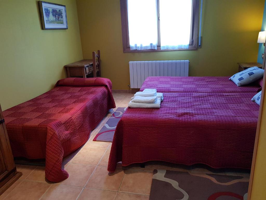 Postel nebo postele na pokoji v ubytování Casa Rural Eguzkilore