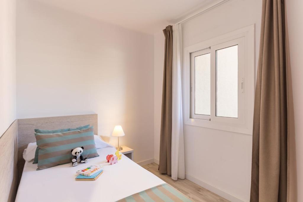 Posteľ alebo postele v izbe v ubytovaní Pierre & Vacances Estartit Playa