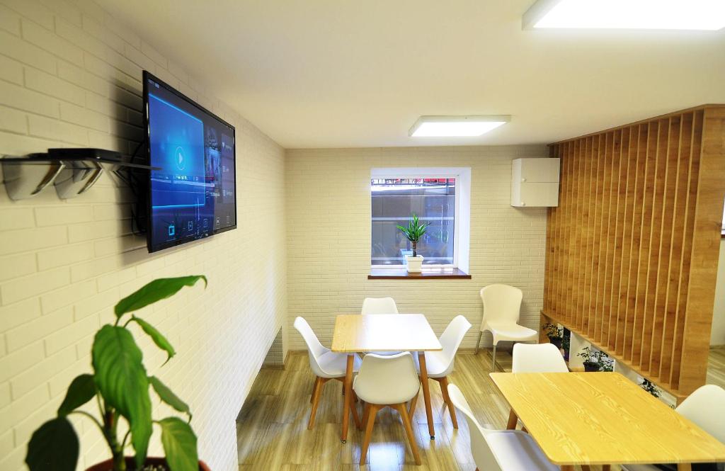 TV a/nebo společenská místnost v ubytování Light Hotel
