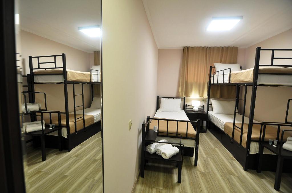 Postel nebo postele na pokoji v ubytování Light Hotel