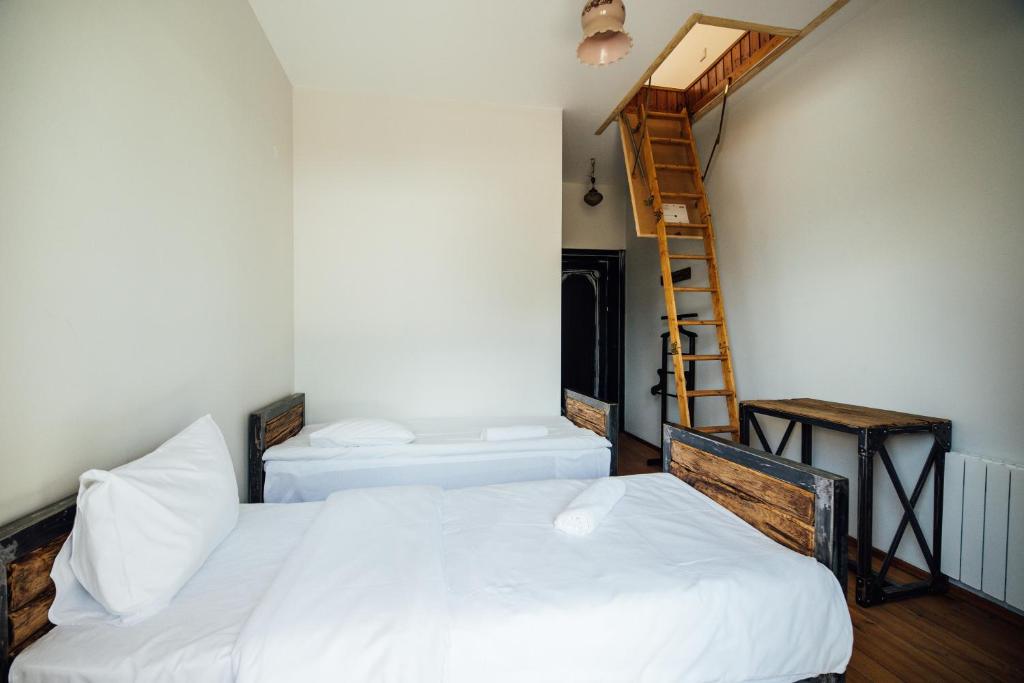 Katil atau katil-katil dalam bilik di Green Sheep Boutique Hotel