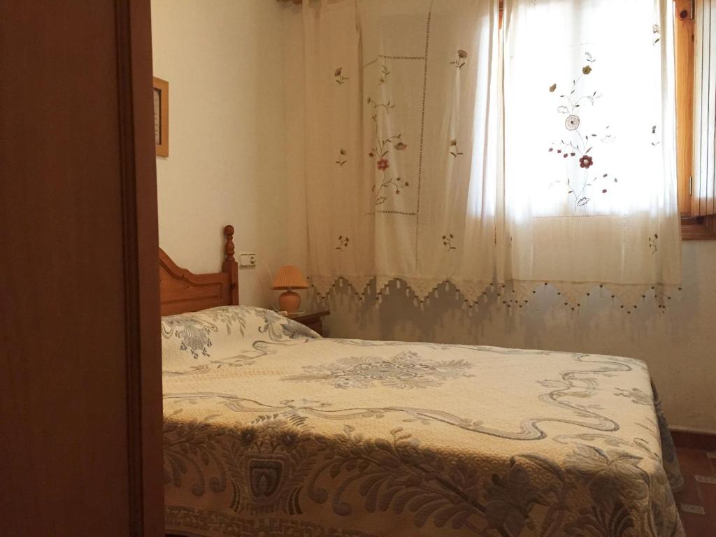 Postel nebo postele na pokoji v ubytování Anacasa Adosado Riu Montan Deveses AD4101