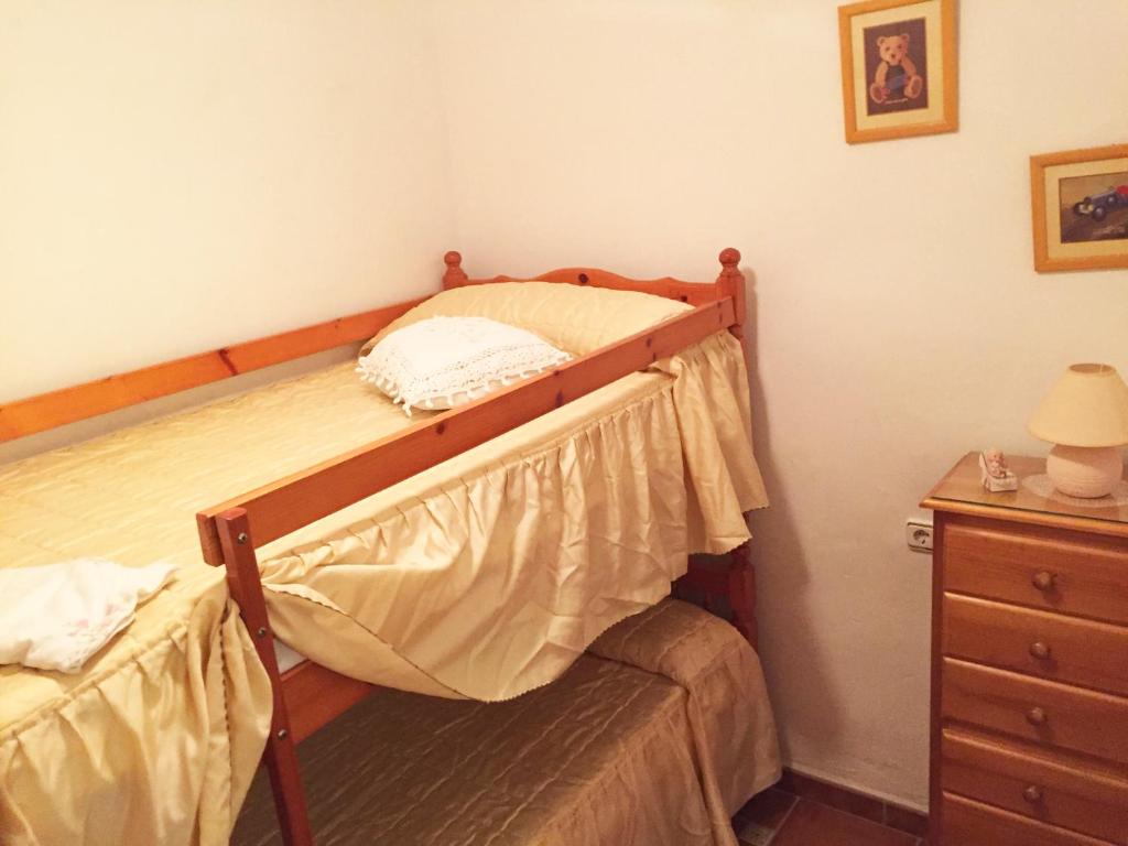 Postel nebo postele na pokoji v ubytování Anacasa Adosado Riu Montan Deveses AD4101