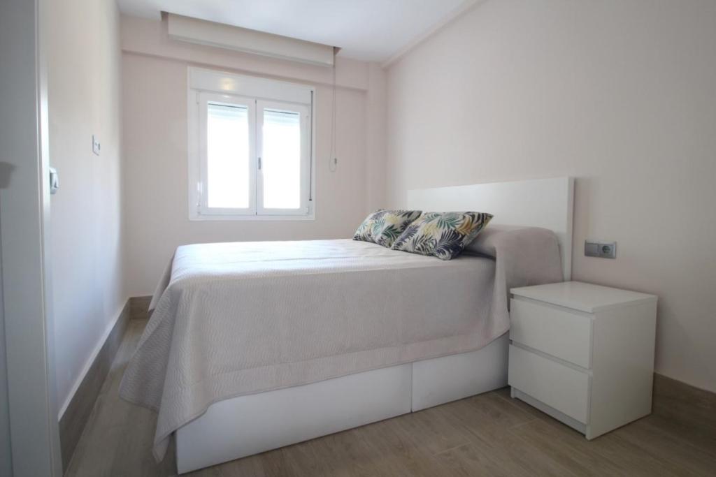 Postel nebo postele na pokoji v ubytování Apartamento Playa Fontanilla