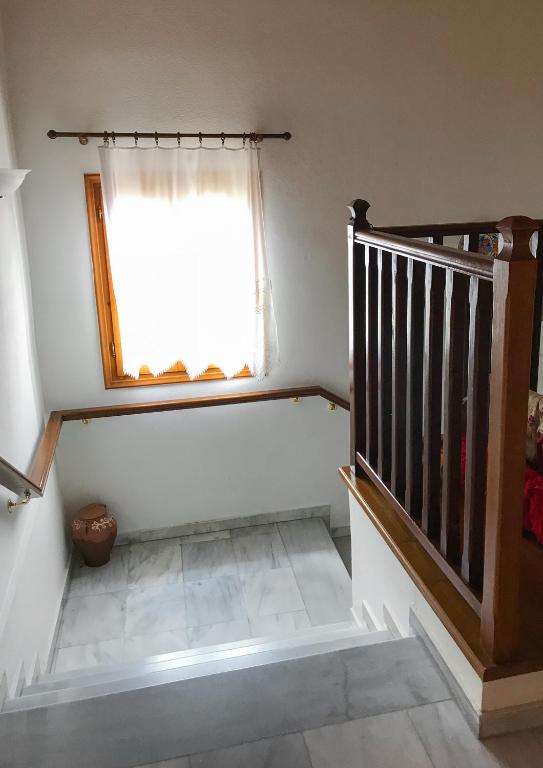 Postel nebo postele na pokoji v ubytování Hotel Antigoni