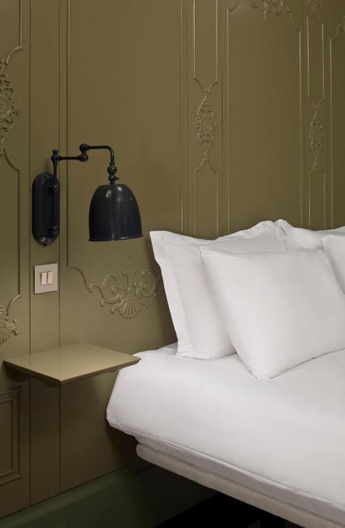 A bed or beds in a room at The Cettia Istanbul