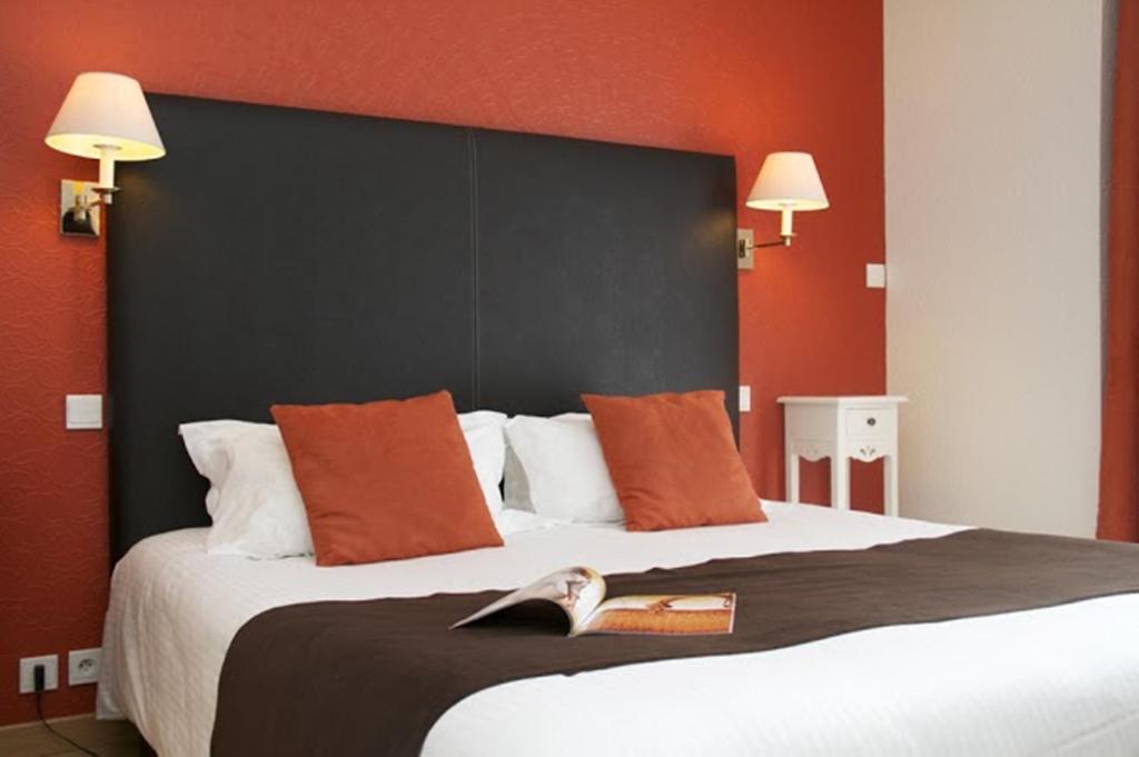 Cama o camas de una habitación en Hôtel Lutétia & Spa