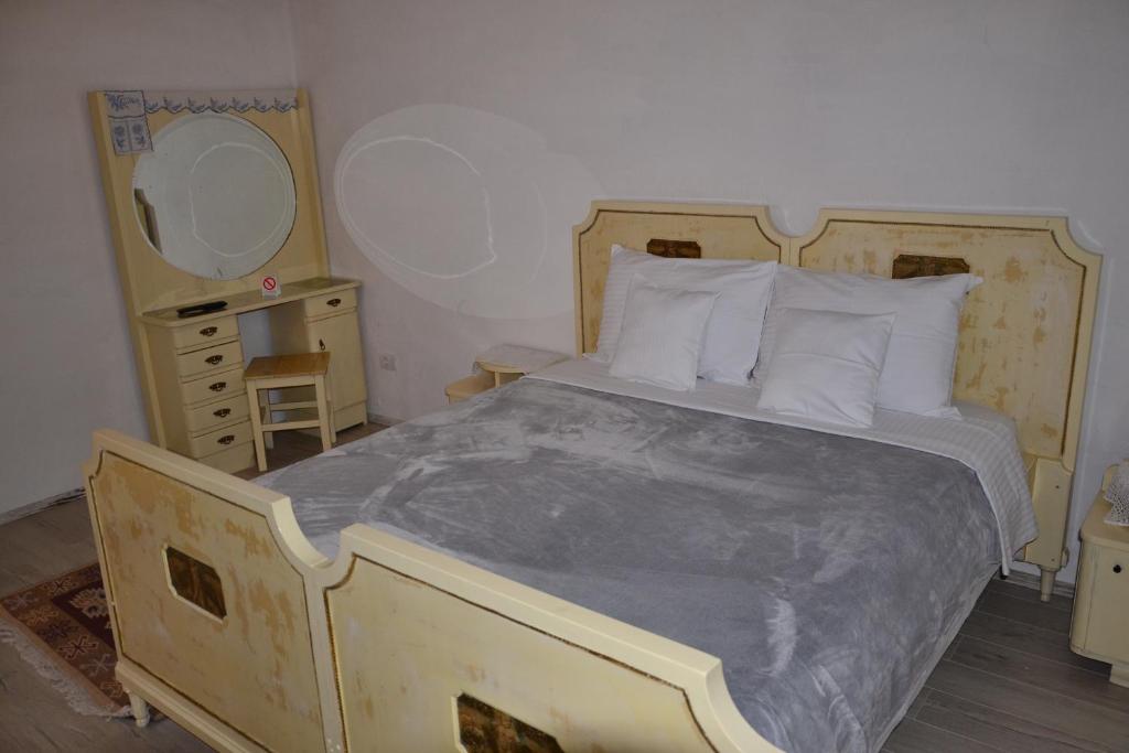 Postel nebo postele na pokoji v ubytování Srpsko Andrejevo Selo