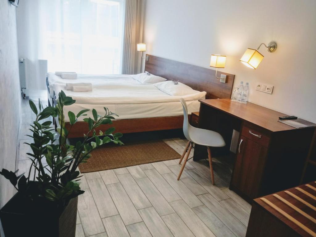 Voodi või voodid majutusasutuse Hotel Miłosz Restauracja, Basen dla dzieci, Sala Zabaw, Siłownia toas
