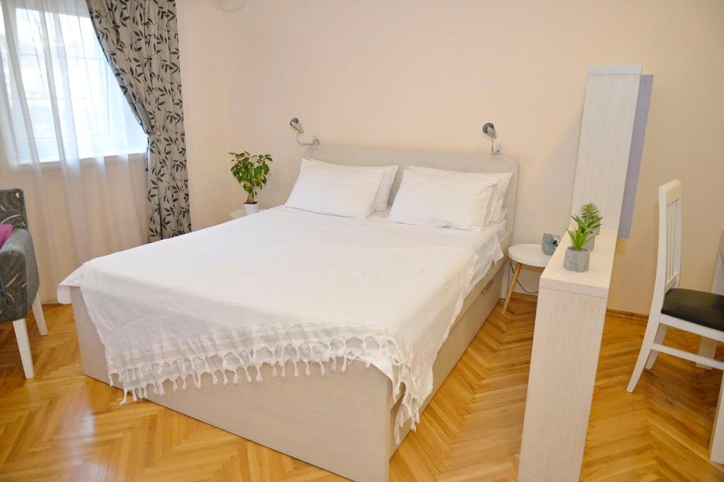Apartment Filip tesisinde bir odada yatak veya yataklar