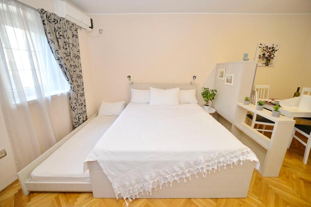 Apartment Filip tesisinde bir odada yatak veya yataklar