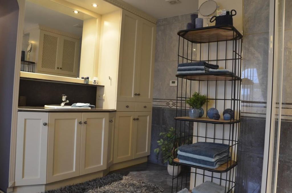 Kuchyň nebo kuchyňský kout v ubytování B&B Serenity