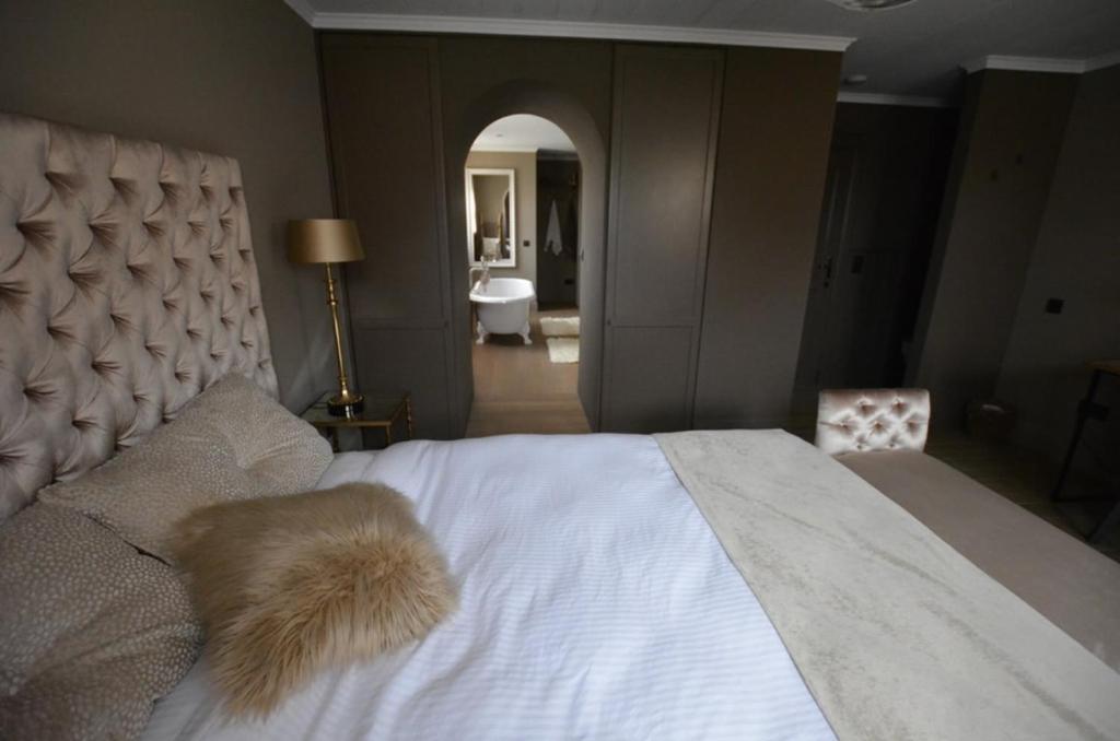Postel nebo postele na pokoji v ubytování B&B Serenity